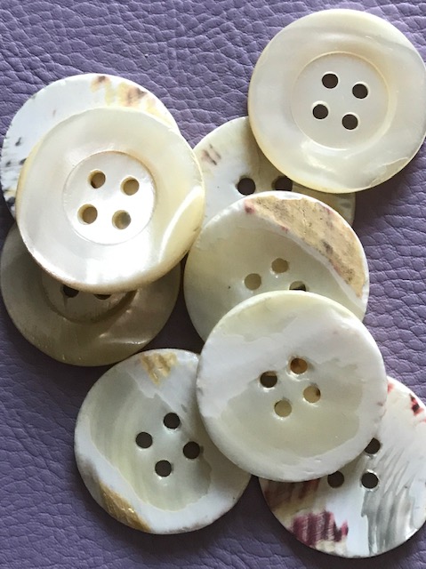 One Mother of Pearl Ivory 29mm 4H Buttons